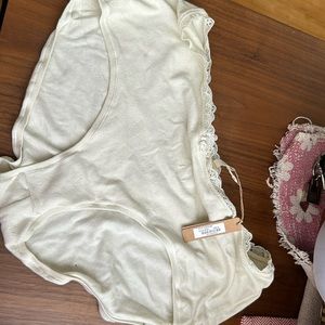 Skims logo panty in bone 3x
